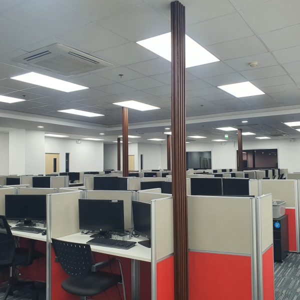 Completed commercial office interior fit-out with fully installed employee workstations